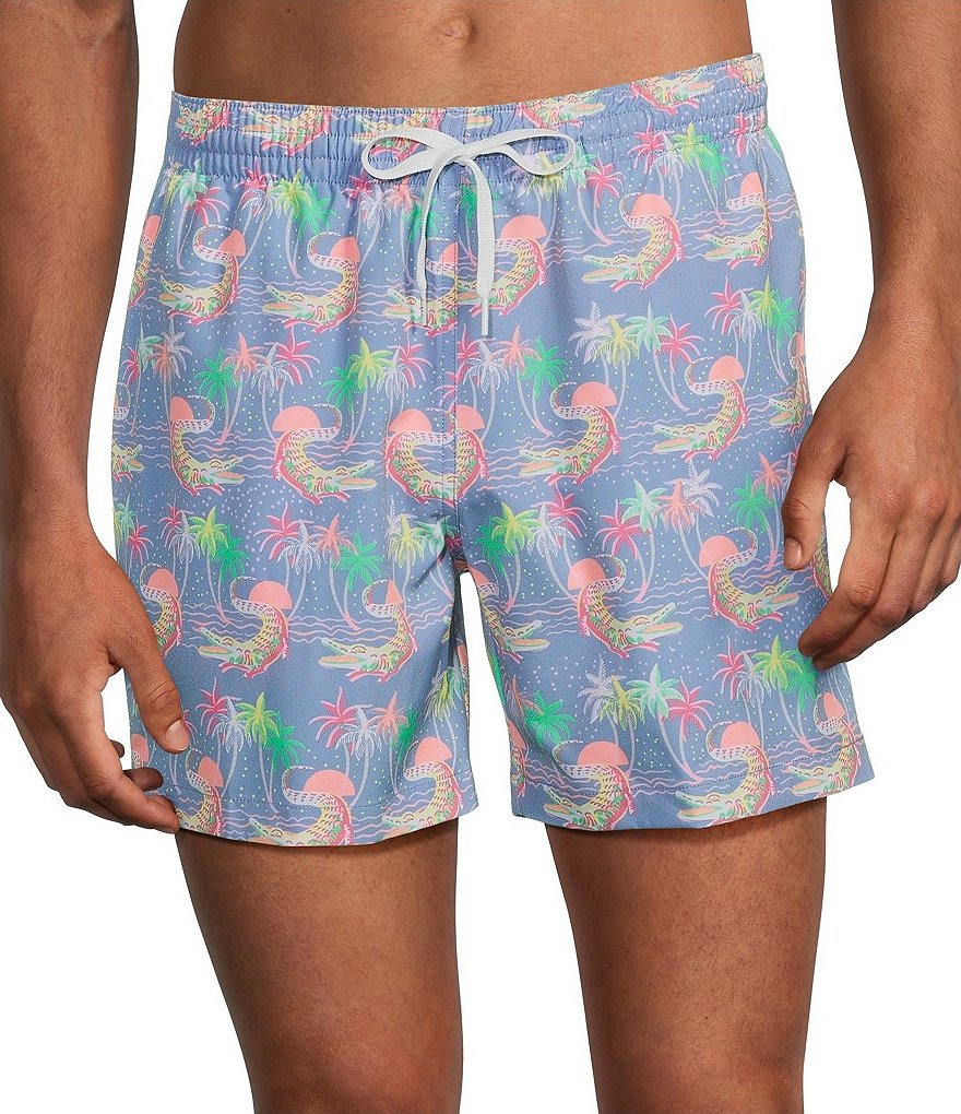 Chubbies dusty blue swim trunks with colorful tropical crocodile and palm tree pattern
