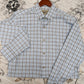Coastal Cotton long-sleeve button-down shirt in light bay blue plaid check pattern on hanger