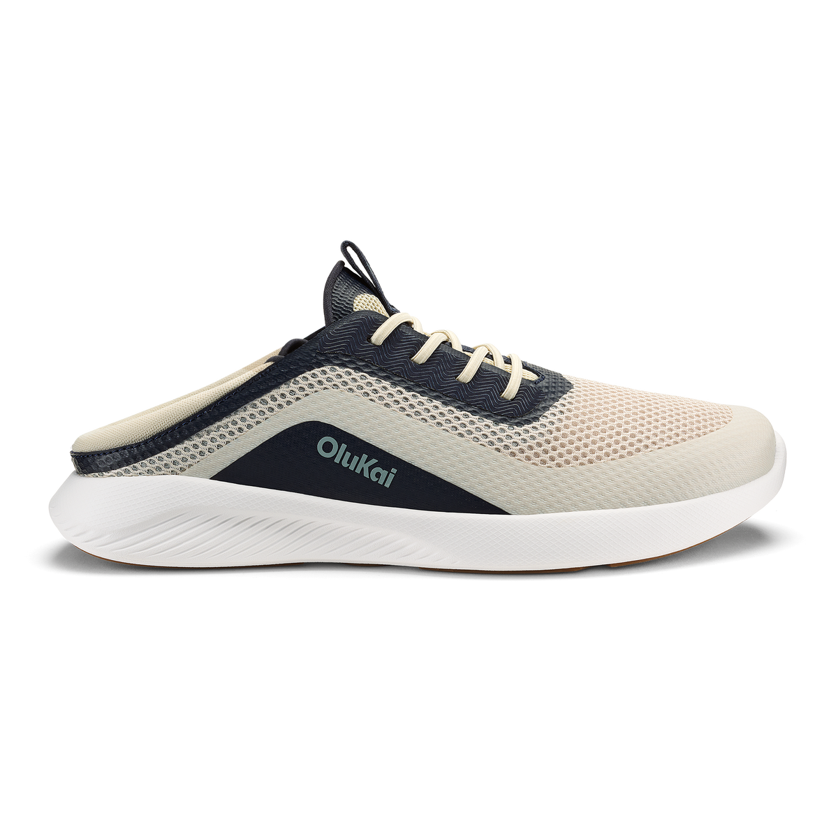 OluKai Men's Kialoa slip-on sneaker in Tapa cream and Trench Blue navy colorway