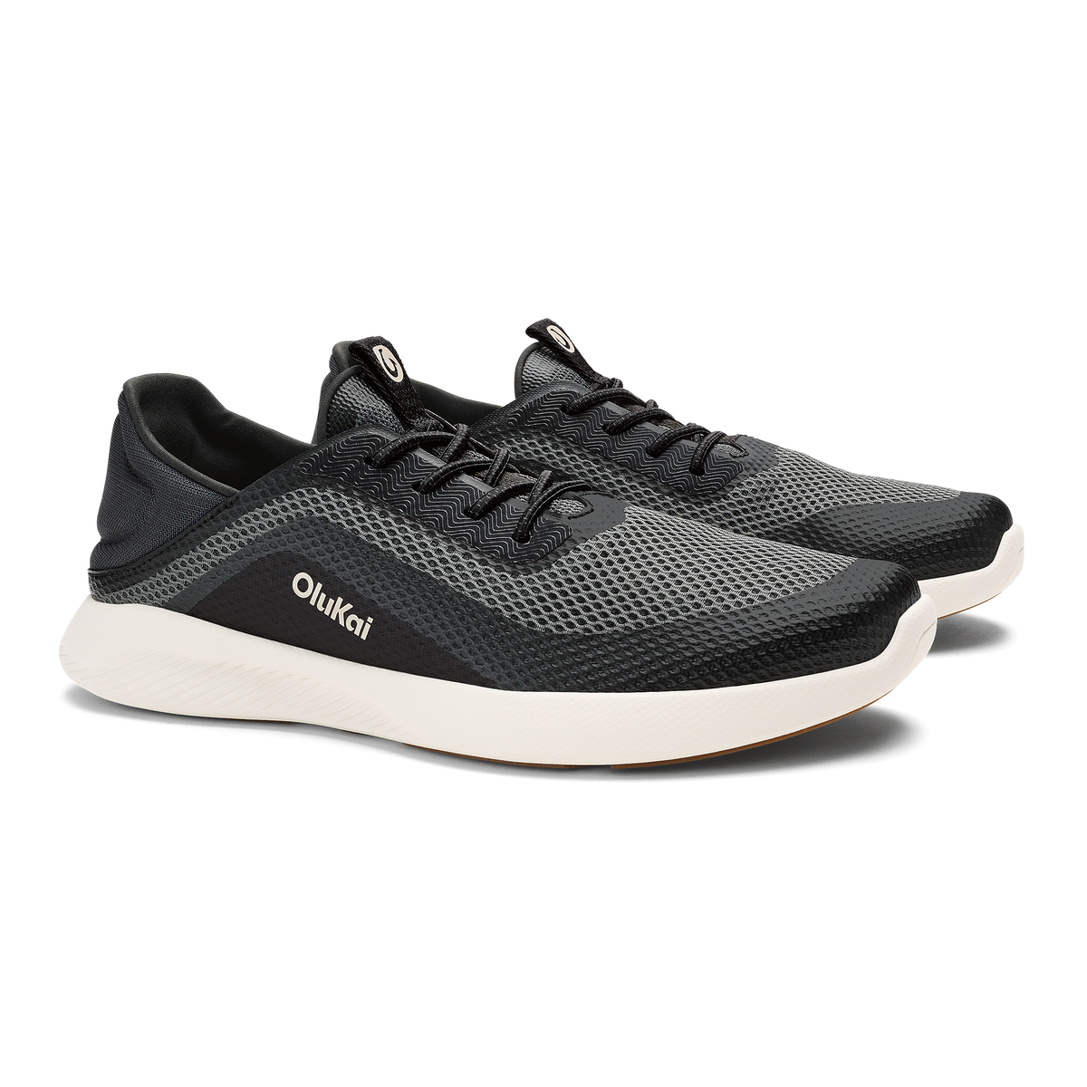 OluKai Men's Kialoa sneaker in Dark Shadow Lava Rock with white midsole, pair view