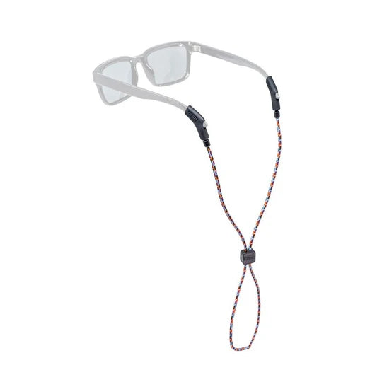 A pair of clear-framed sunglasses with a red, blue, and black braided neck strap, shown on a plain white background.