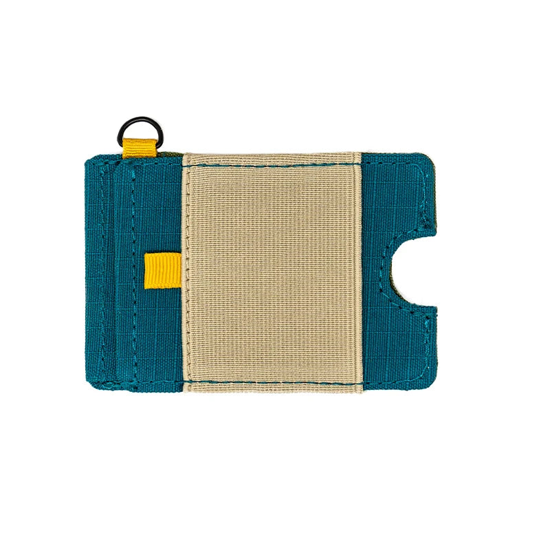 Small wallet with teal border and beige center on a white background