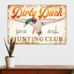 Dirty Duck Hunting Club vintage metal sign with mallard duck, orange script text, and rustic distressed finish