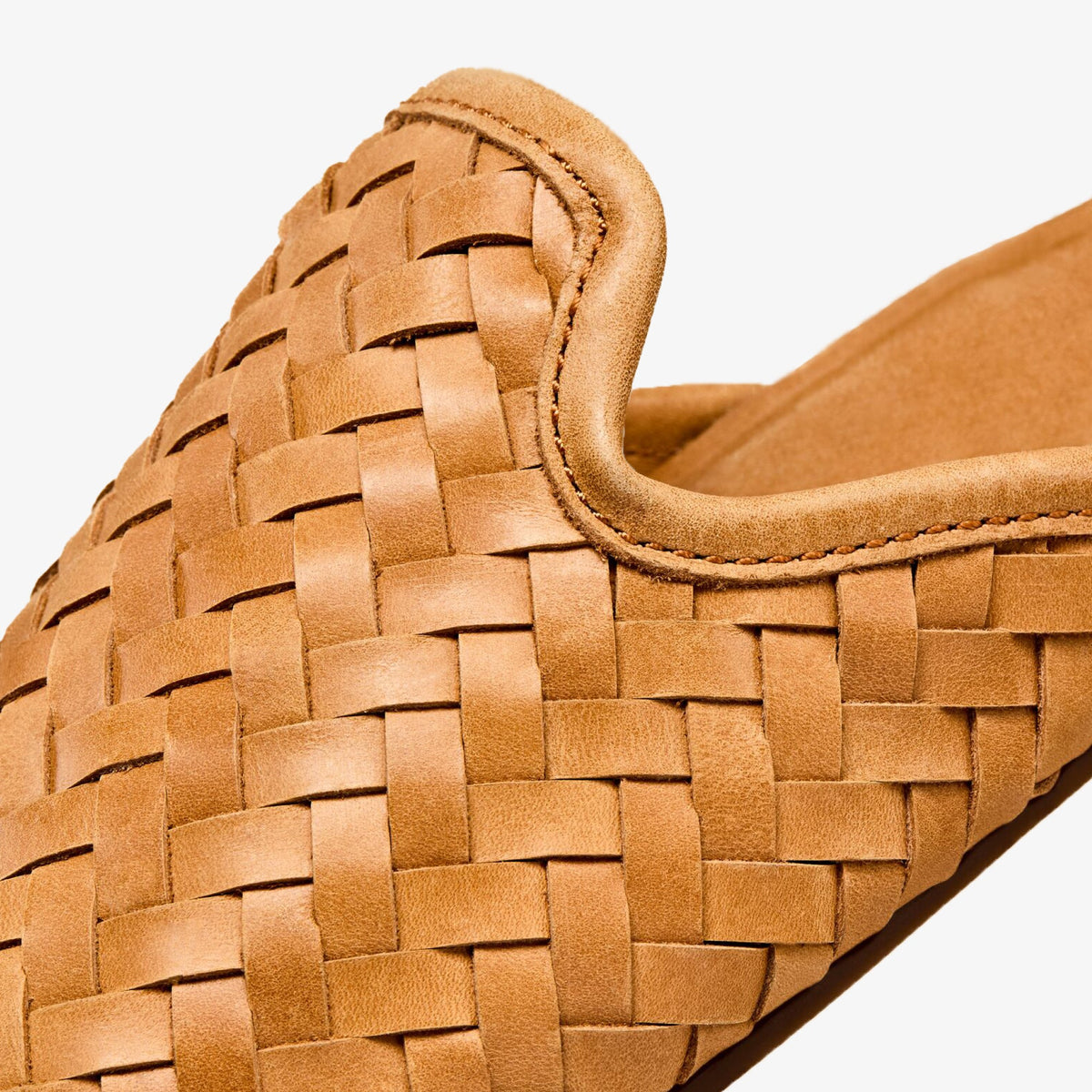 OluKai Mi'i women's mule shoe in Kukui Brown woven leather close-up detail view