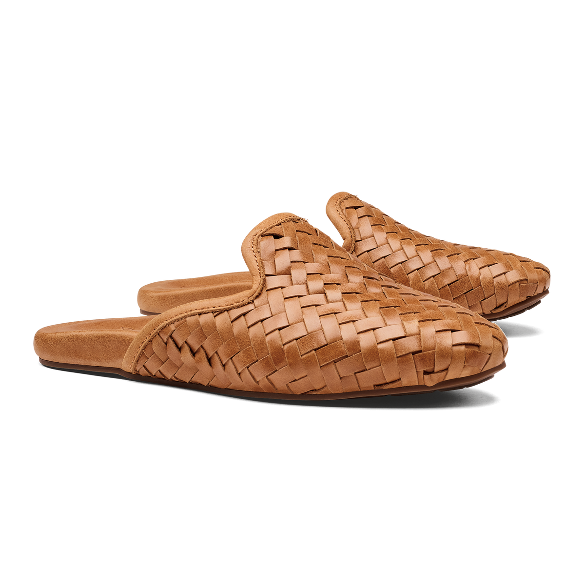 OluKai Mi'i women's woven leather mule slip-on shoes in Kukui Brown, pair shown