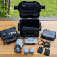 YETI LoadOut GoBox 8 in black open with DJI drone and accessories displayed outside