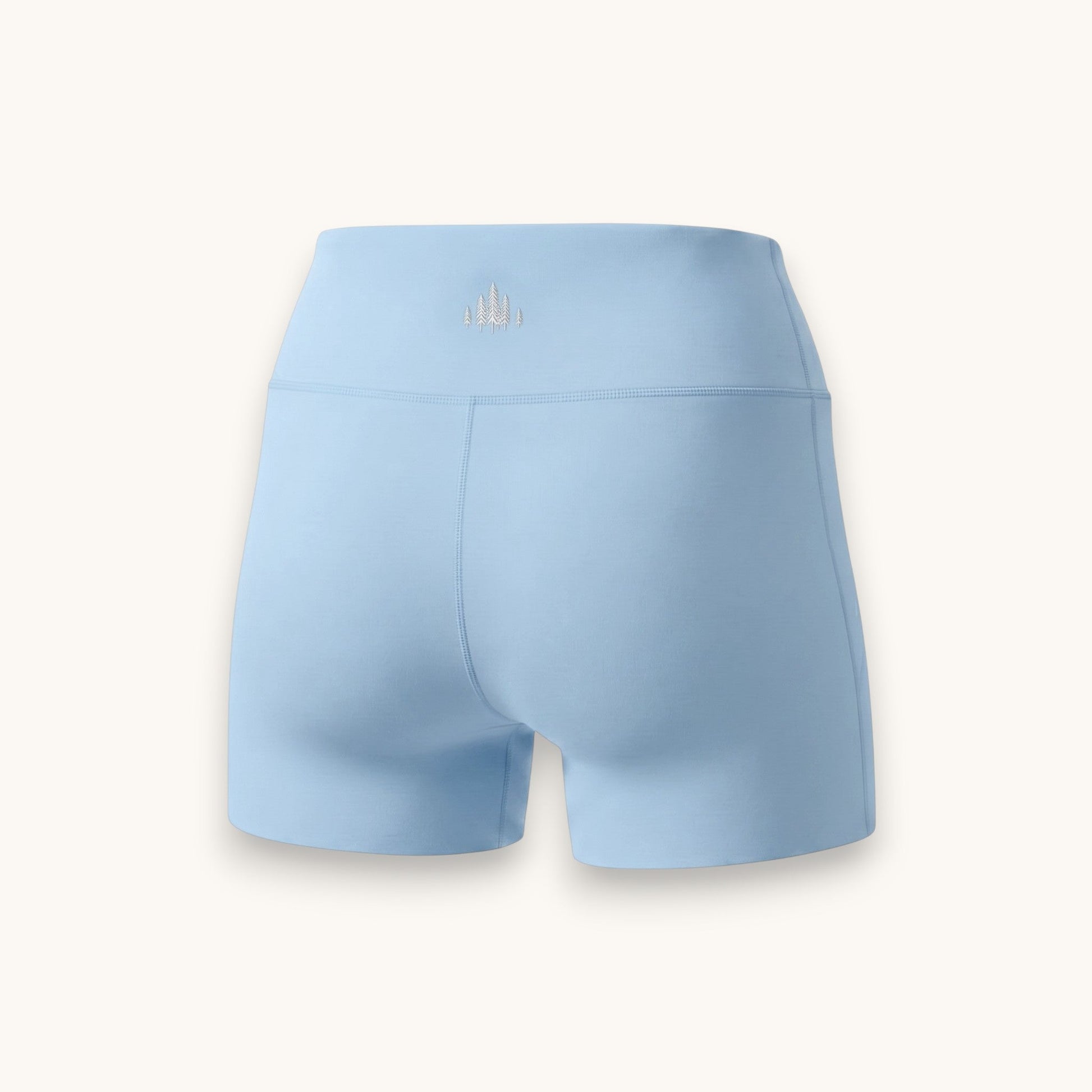 Mercifully Made Short in sky blue, high-waist athletic bike shorts, back view with logo