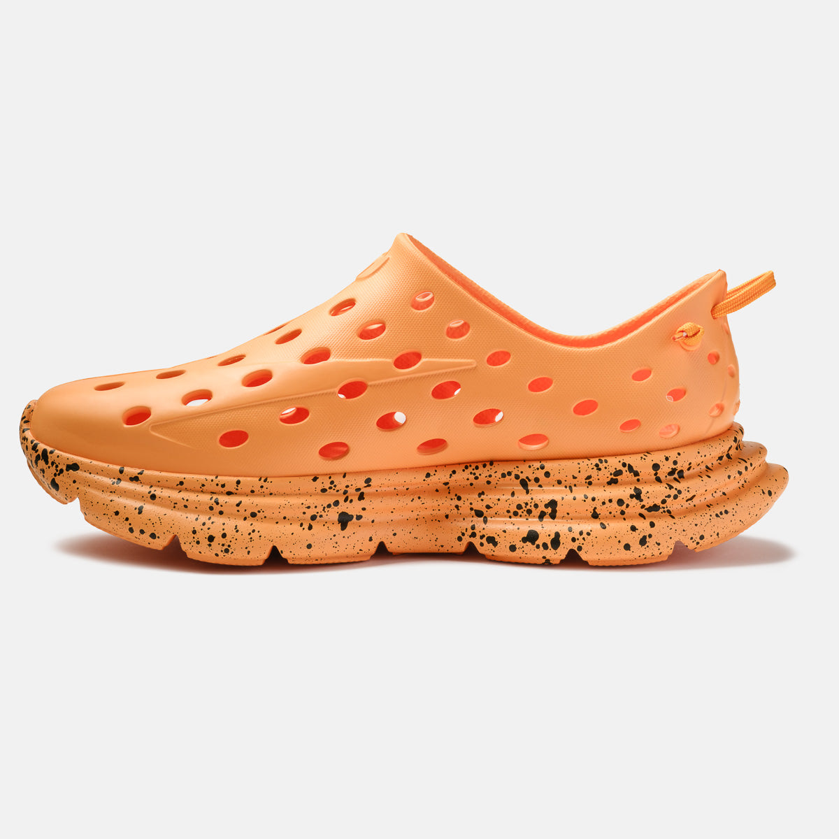 Kane Revive slip-on shoe in electric orange with black speckled chunky midsole and perforated upper