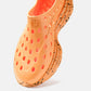 Kane Revive clog shoe in electric orange with black speckled chunky sole and ventilation holes
