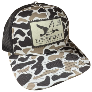 Little River Hat Co. Duck Stamp 112 trucker hat in Dirt Road Camo with black mesh back