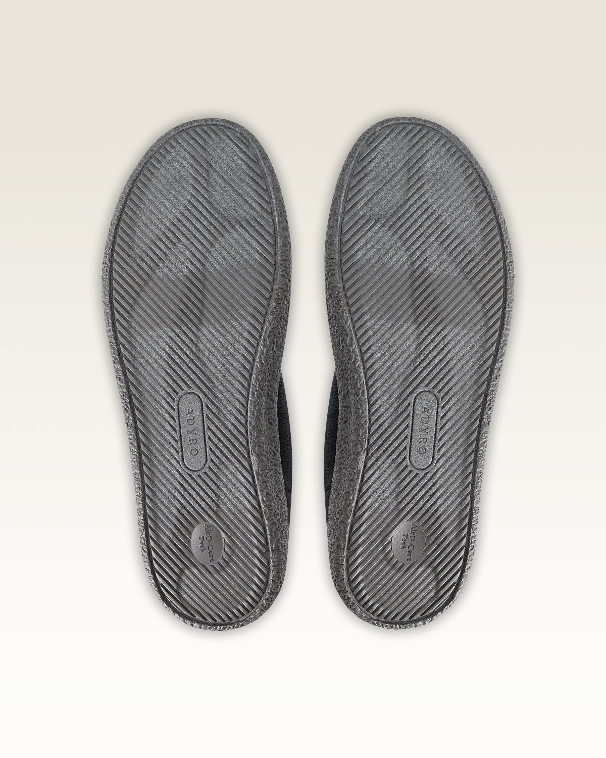 Adyro Primo 2.0 Jet Black shoe bottom view showing ribbed outsole tread pattern