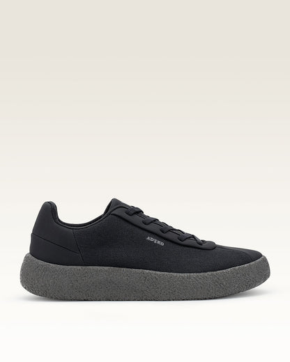 Adyro Primo 2.0 Jet Black sneaker with black canvas upper and dark textured sole, side view