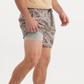 Gray camouflage swim trunks with elastic waistband and built-in compression shorts liner