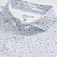 Johnnie-O Cabana Bar polo shirt in Carbon Fiber colorway with blue and peach paisley pattern on white