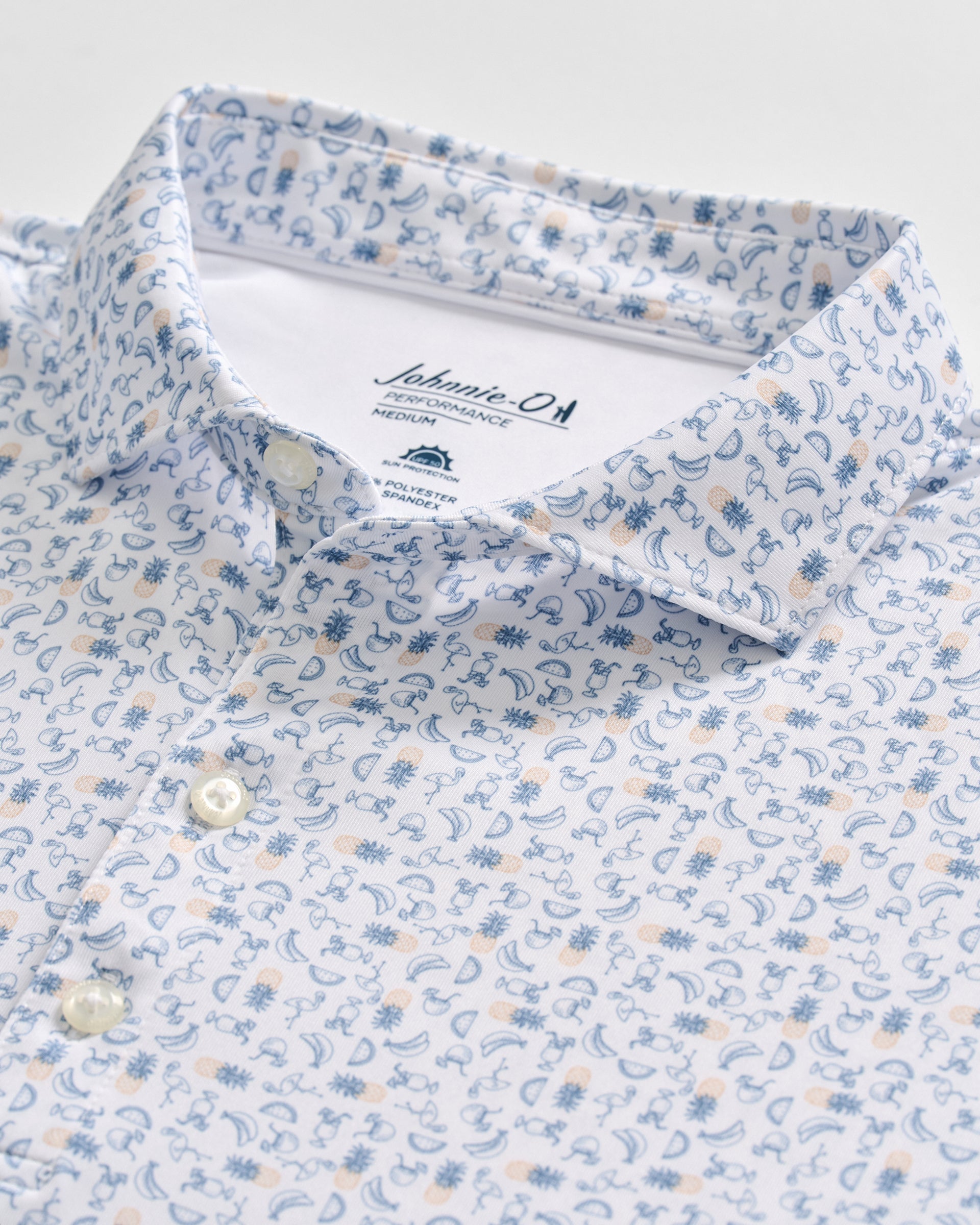 Johnnie-O Cabana Bar polo shirt in Carbon Fiber colorway with blue and peach paisley pattern on white