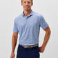 Light blue Johnnie-O Prawn Polo shirt with small white dot pattern worn by smiling man