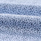 Light blue Johnnie-O Prawn Polo shirt with dark blue paisley print pattern