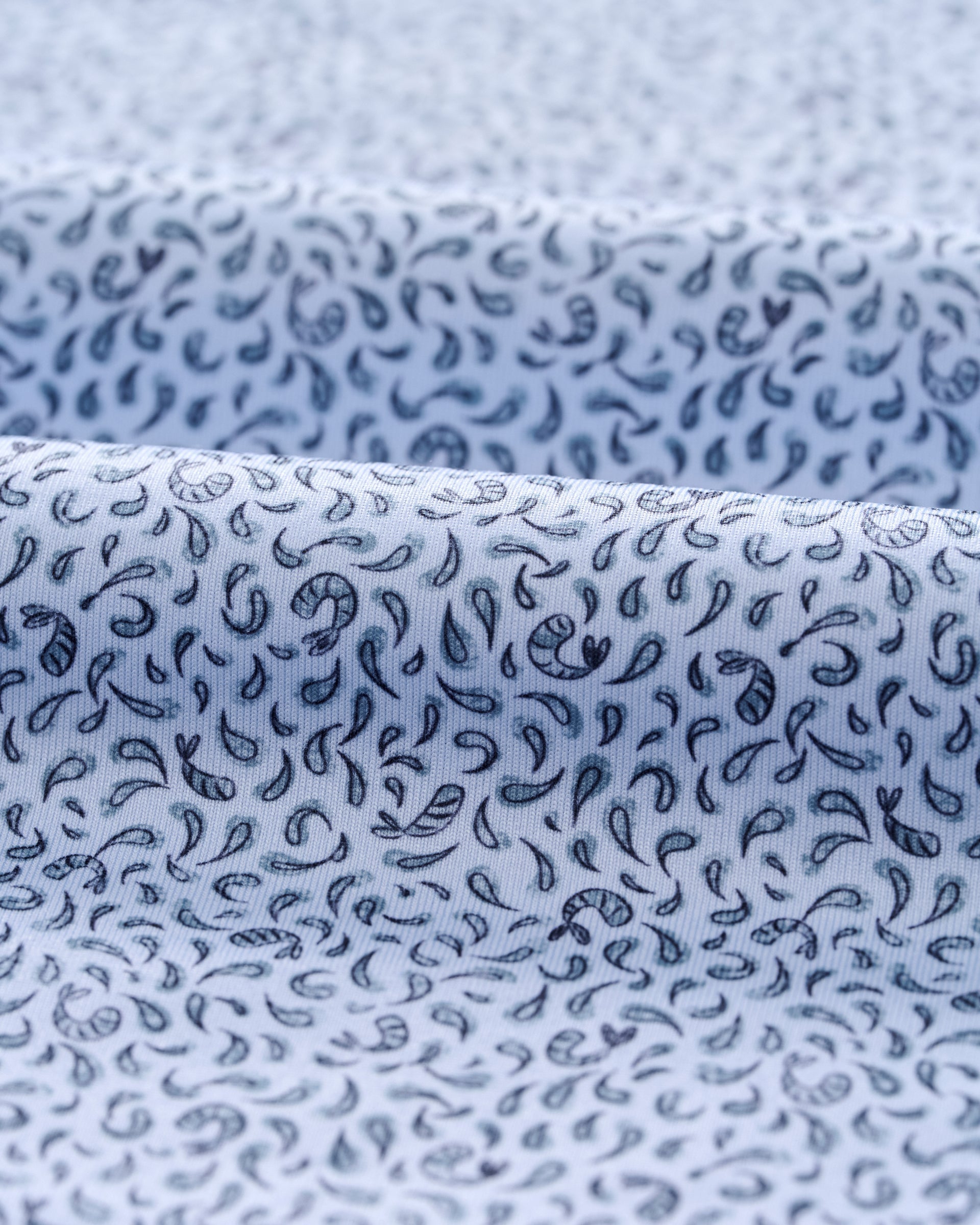 Light blue Johnnie-O Prawn Polo shirt with dark blue paisley print pattern