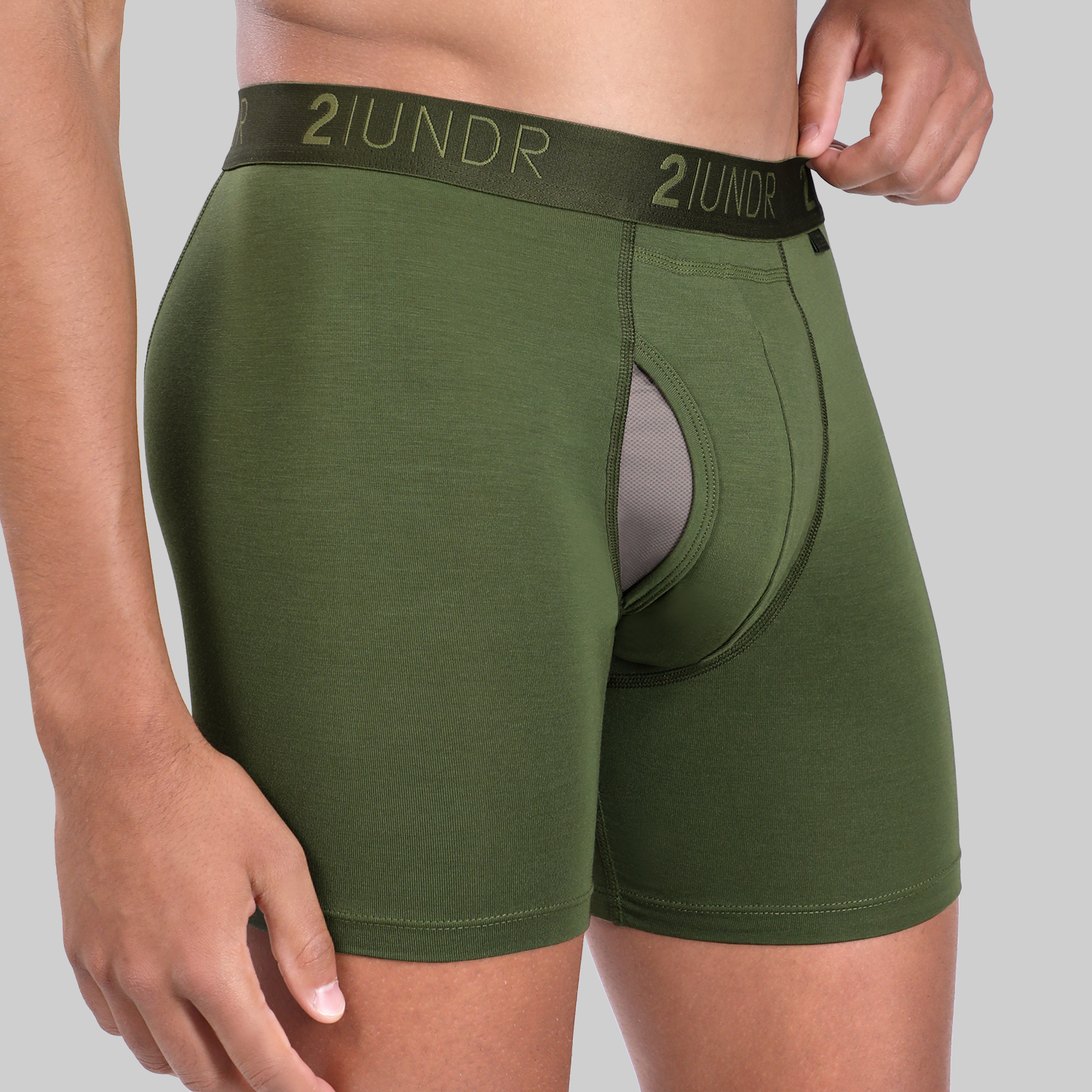 2UNDR Army Green Swing Shift 6-inch boxer briefs with contoured pouch on male model