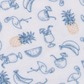 Johnnie-O Cabana Bar Polo in Carbon Fiber pattern featuring blue tropical motifs and peach pineapples