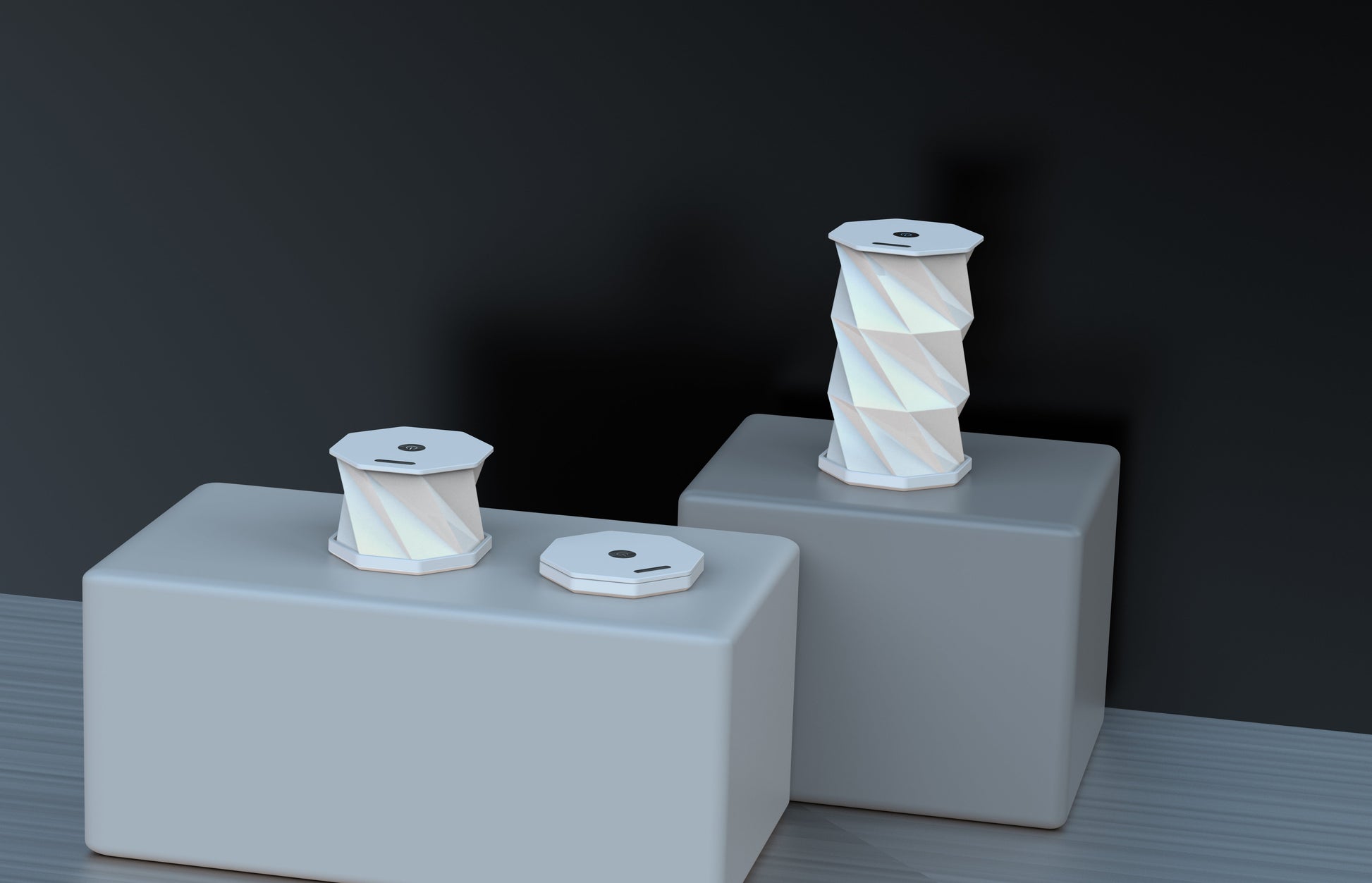 Illumates Large Lamp in white with geometric twisted design displayed on white pedestals